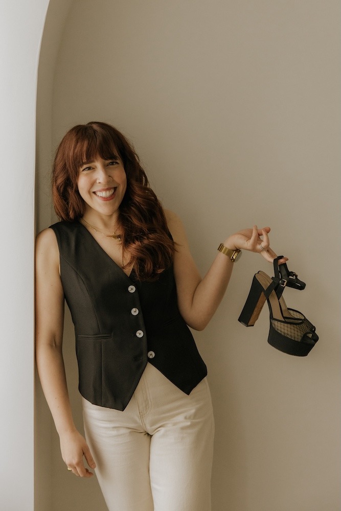 Dr Courteney Werner showing off her favourite item shoes